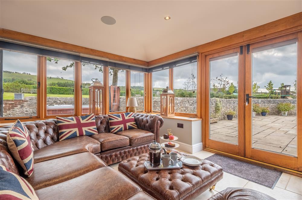 Ground floor: Open-plan family room with french doors out to the garden terrace  at Ham Farm, Sydling St Nicholas