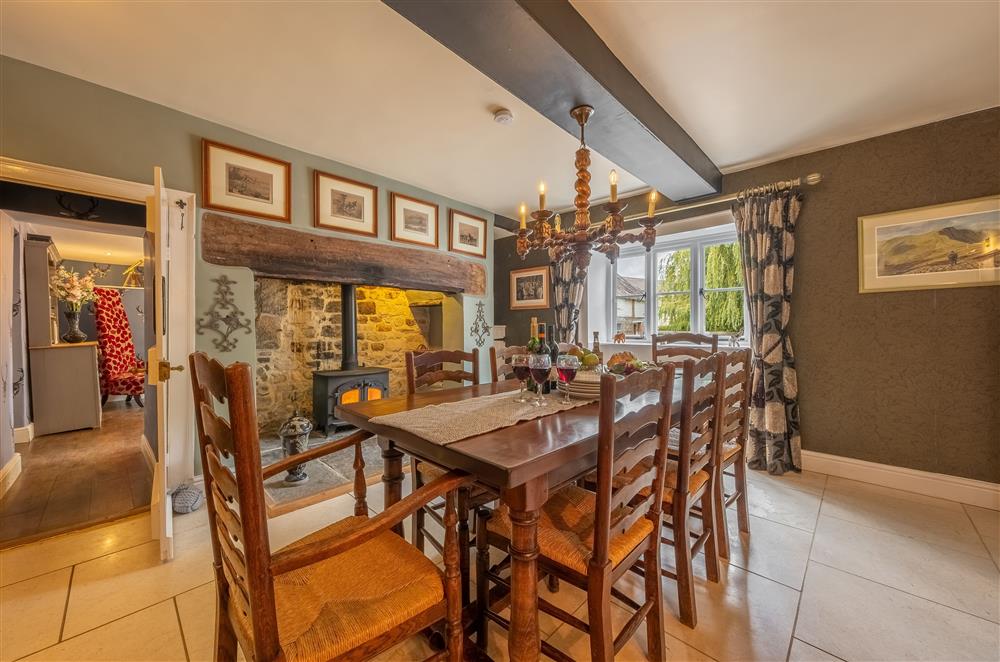 Ground floor: The dining room with inglenook fireplace and wood burning stove at Ham Farm, Sydling St Nicholas