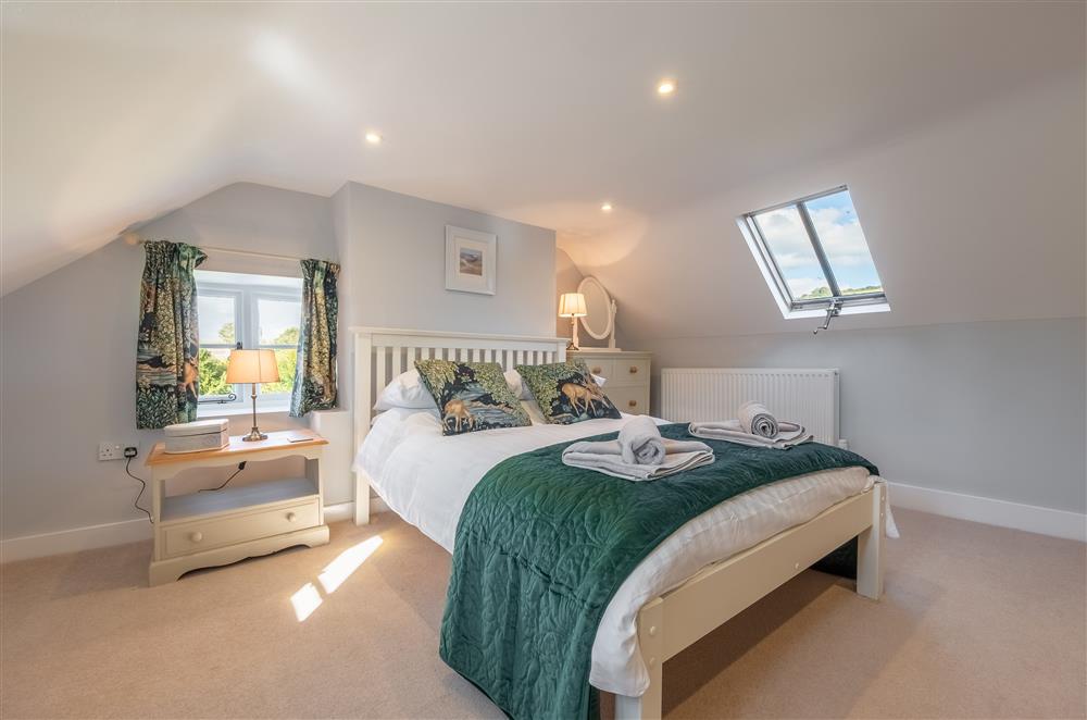 Second floor: Bedroom five with double bed and Smart television at Ham Farm, Sydling St Nicholas
