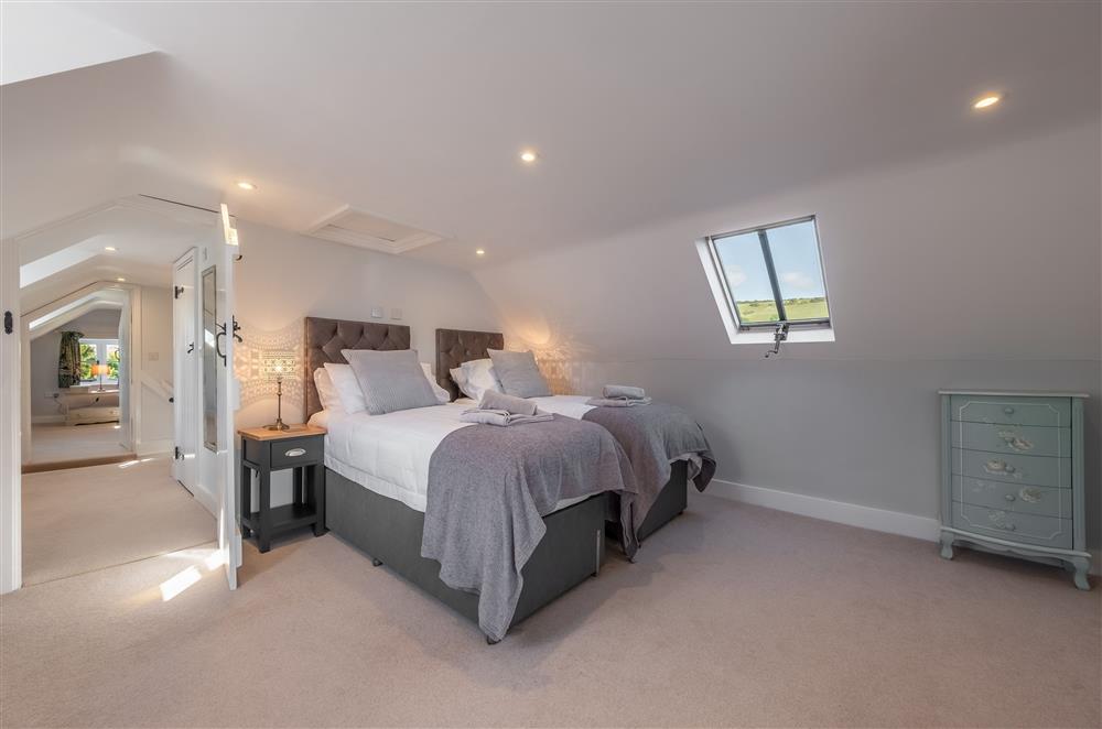 Second floor: Bedroom six with twin single beds and television at Ham Farm, Sydling St Nicholas