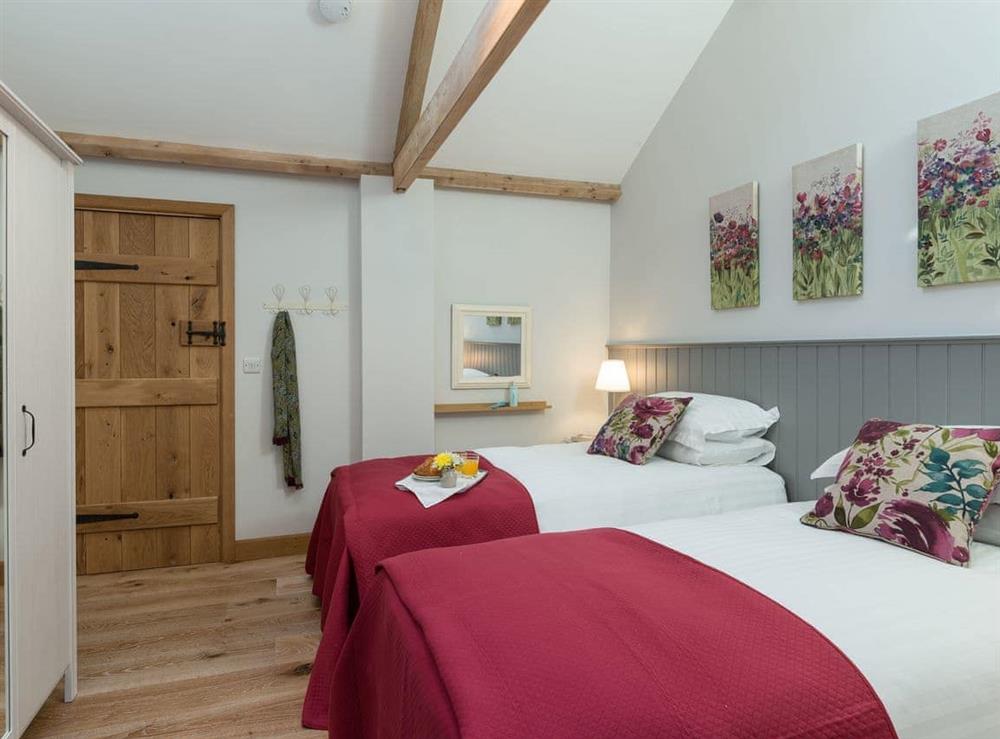 Twin bedroom at Daisy Cottage, 