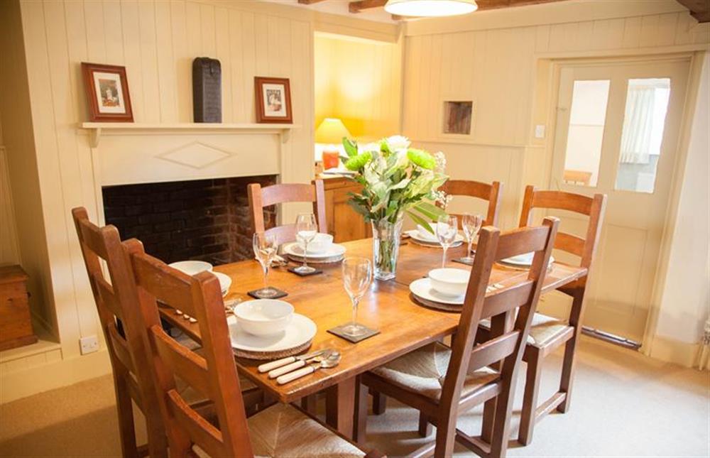 Ground floor:  Dining area with table and seating for six at Hambledon, Cley-next-the-Sea near Holt