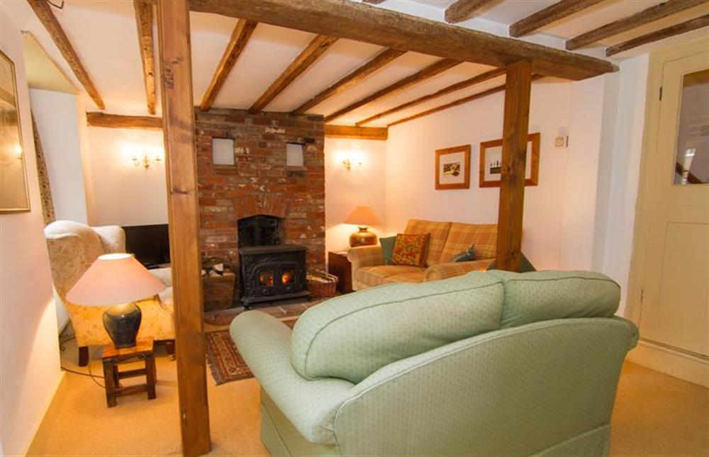 Ground floor:  Sitting area with feature beamed ceiling at Hambledon, Cley-next-the-Sea near Holt