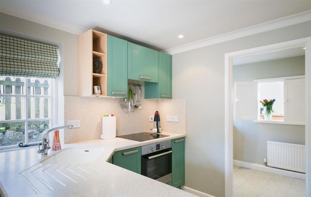 Open plan kitchen with snug/sitting area (photo 2) at Hamilton House, Branscombe