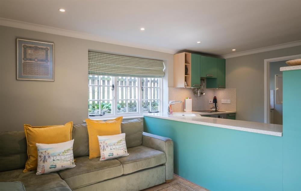 Open plan kitchen with snug/sitting area (photo 3) at Hamilton House, Branscombe