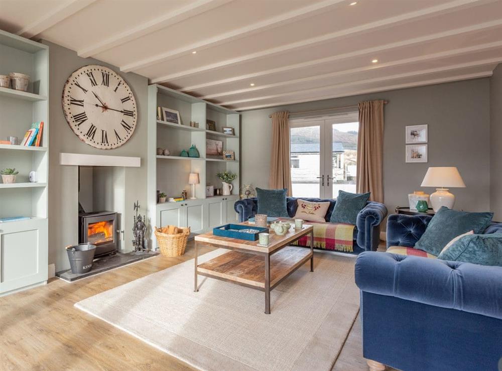 Welcoming living area with wood burner at Hamnavoe in Kinlocheil, near Fort William, Inverness-Shire