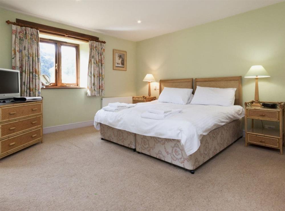 Calming bedroom with en-suite bathroom (photo 2) at Hanger Mill Barn in Salcombe, Devon