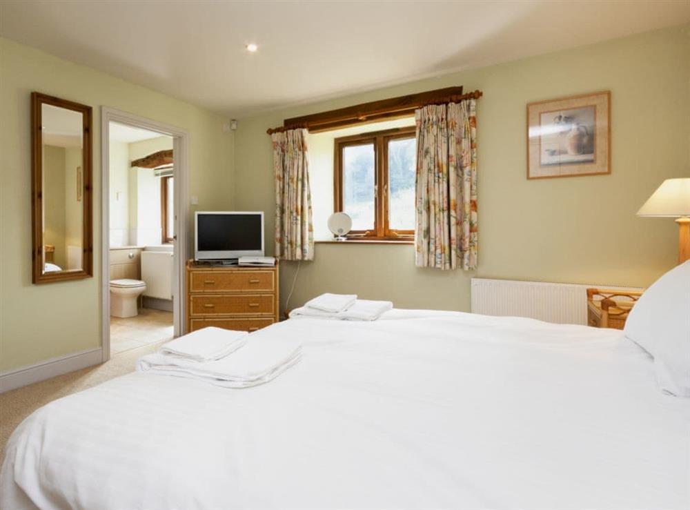 Calming bedroom with en-suite bathroom (photo 3) at Hanger Mill Barn in Salcombe, Devon