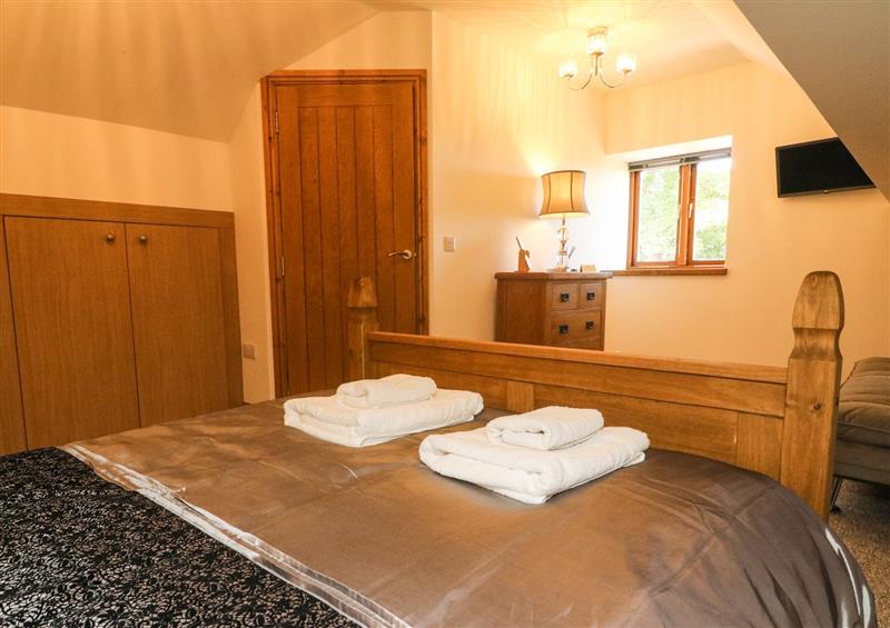 A bedroom in Hannah's Cottage at Hannahs Cottage, Preston Patrick near Endmoor