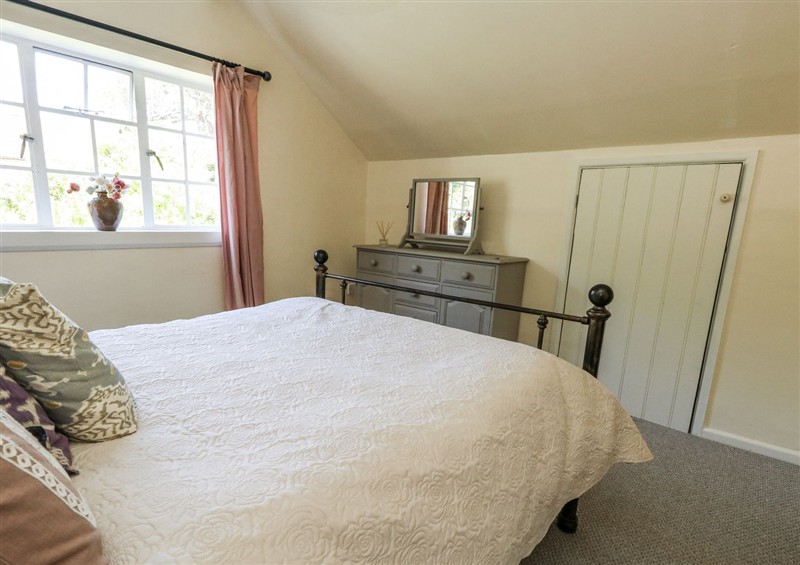 A bedroom in Happiness Cottage at Happiness Cottage, Piddlehinton