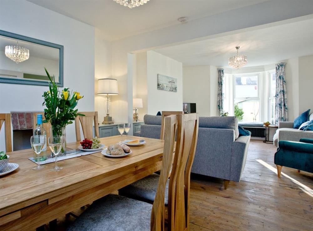 Well-furnished living and dining room at Happy Place in Brixham, Devon