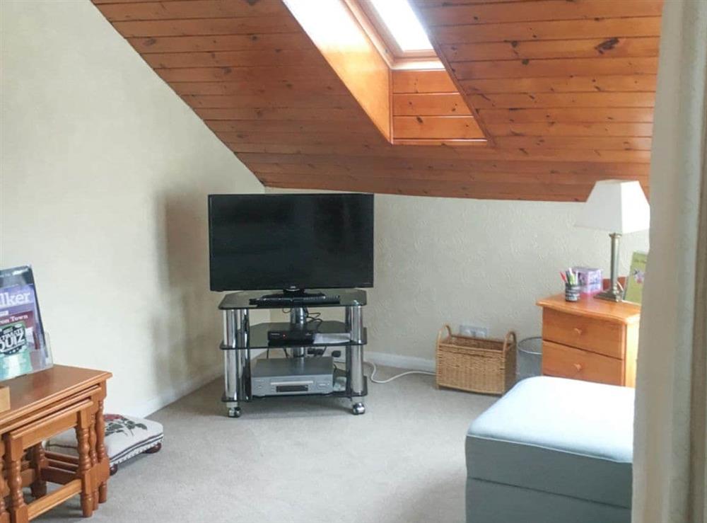 Appealing living room with balcony access at Harbour Cottage in Haverigg, near Millom, Cumbria