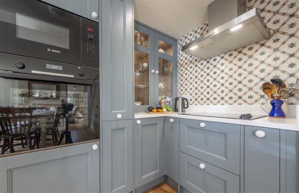 A well-equipped smart fitted kitchen at Harbour Cottage, Wells-next-the-Sea