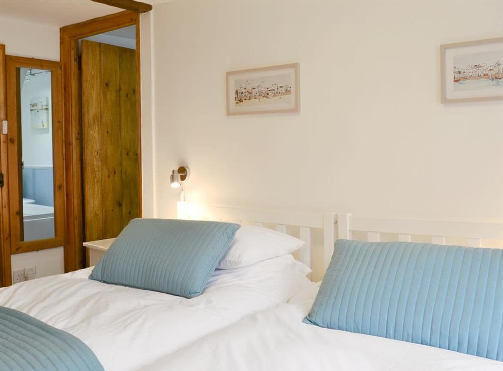 Comfy twin bedroom at Harbour Hideaway in Ilfracombe, Devon