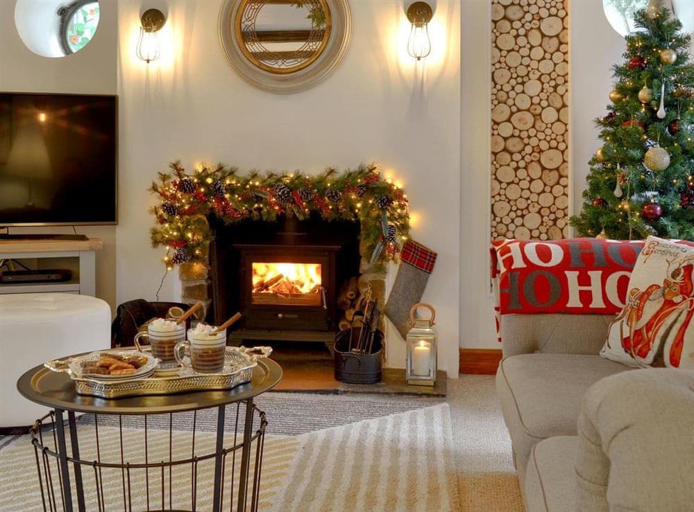 Delightful living room at Christmas at Harbour Hideaway in Ilfracombe, Devon