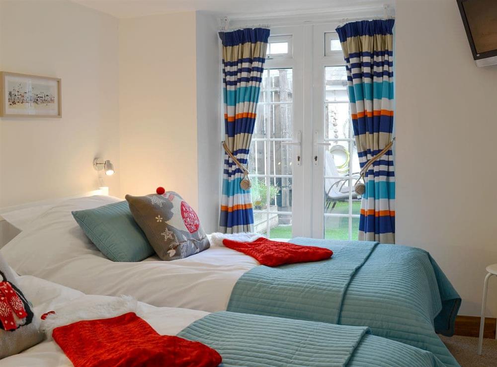 Twin bedroom at Christmas at Harbour Hideaway in Ilfracombe, Devon