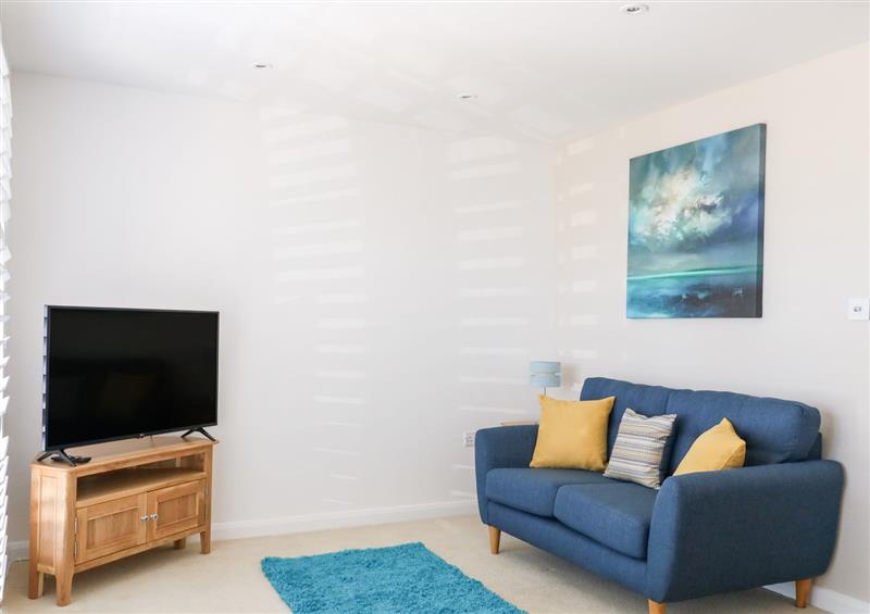 Relax in the living area at Harbour Hideaway, Weymouth