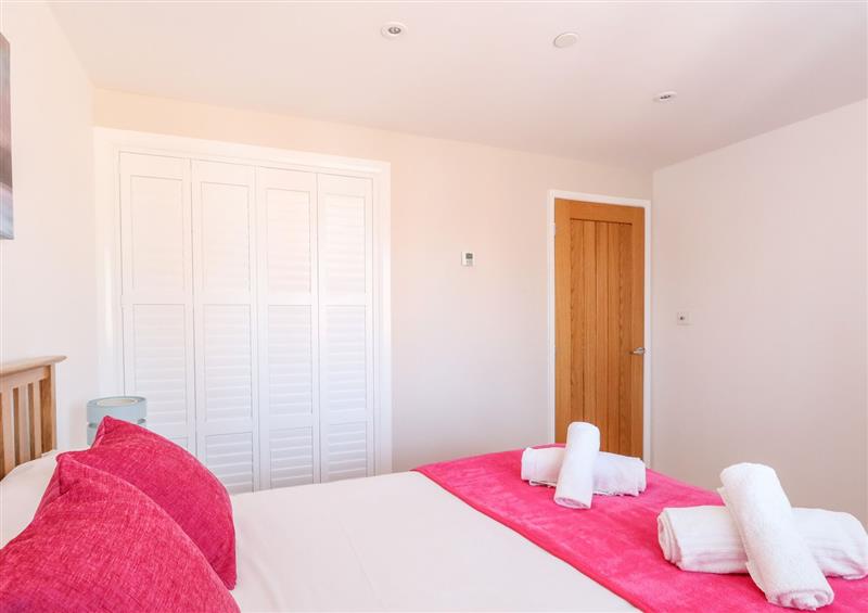 This is a bedroom at Harbour Hideaway, Weymouth