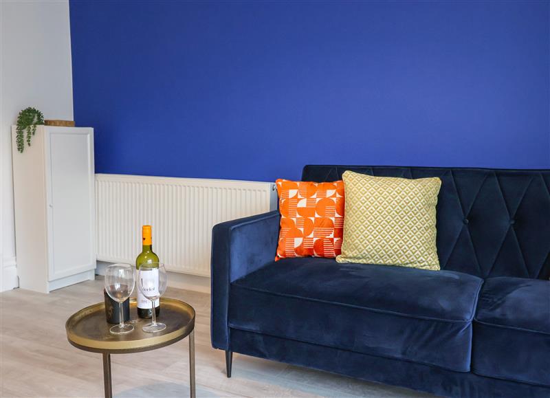 Relax in the living area at Harbour Lights Apartment, Weymouth