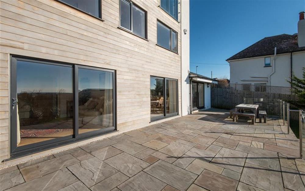 Large patio doors access the sun terrace at Harbour Lights in Bridport
