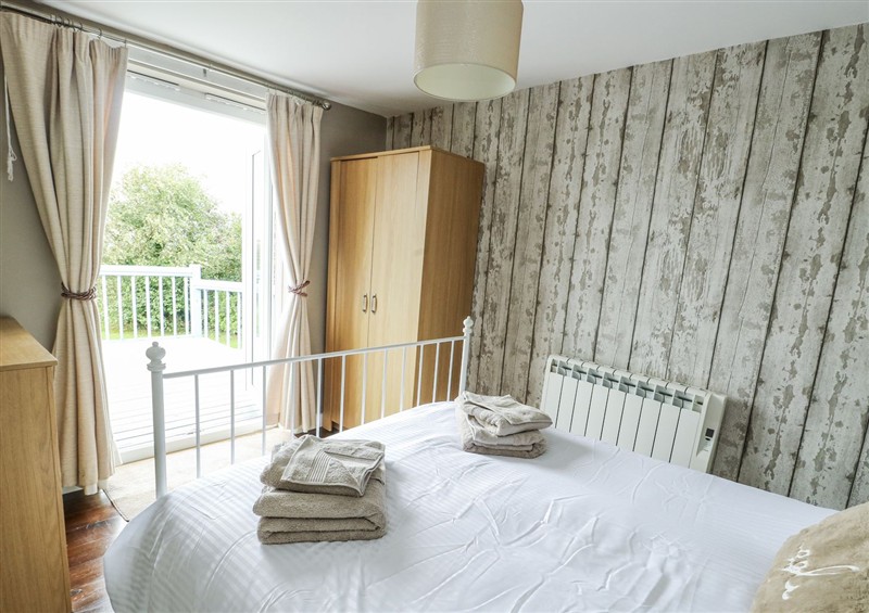 This is a bedroom at Harbour Lights, Church Bay