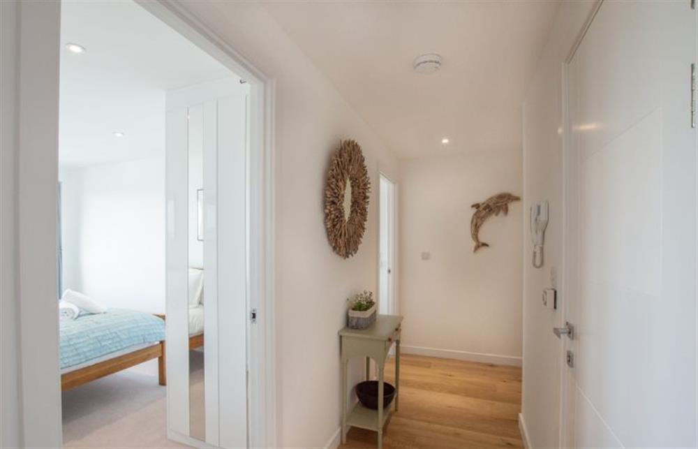 Hallway leading to both bedrooms and family bathroom at Harbour Lights, Newquay 