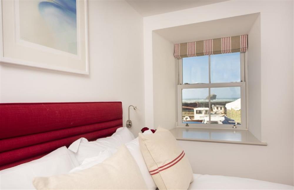 Bedroom one with sea views at Harbour Masters House, Portreath