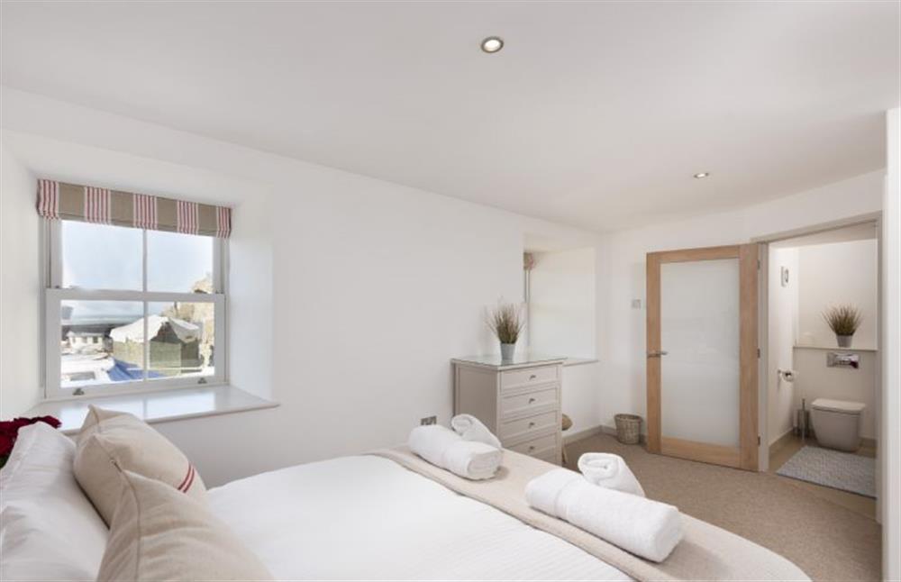 Bedroom one with spacious accommodation at Harbour Masters House, Portreath