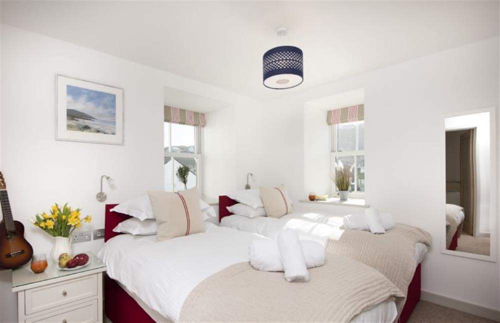 Bedroom two with twin single beds at Harbour Masters House, Portreath