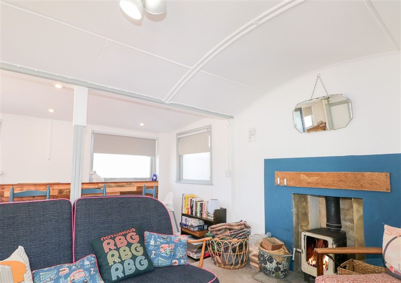 This is the living room at Harbour Road Quirky Beach Railway Carriages, Pagham
