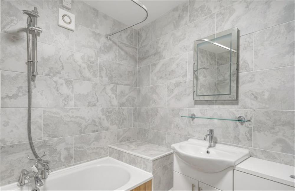 Bathroom comes equipped with bath and overhead shower, heated towel rail, wash basin and WC (photo 2) at Harbour Steps, Falmouth