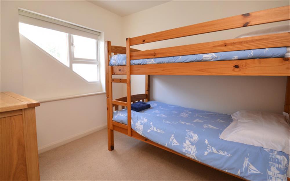Bedroom 2 with bunk beds at Harbour View Apartment in Salcombe