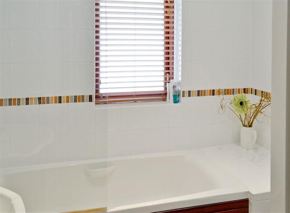 Family bathroom with shower over bath at Harbour View in Castletown, Isle Of Man