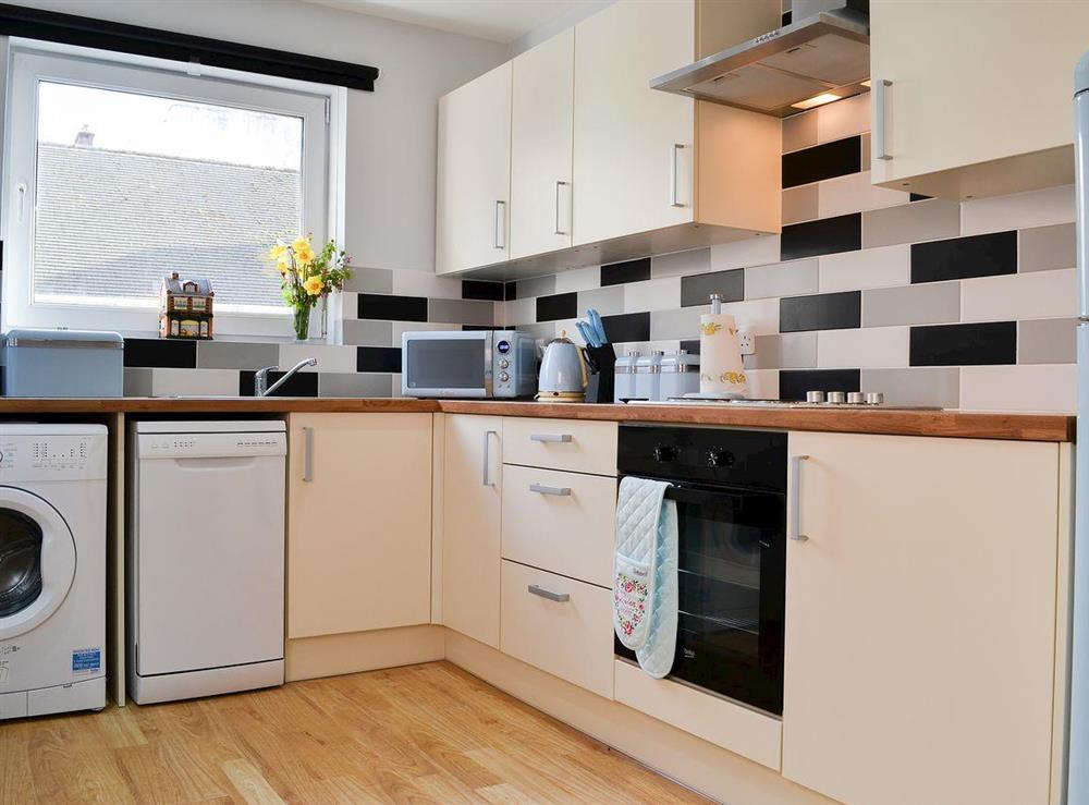 Lovely well-equipped fitted kitchen at Harbour View in Oban, Argyll and Bute, Scotland