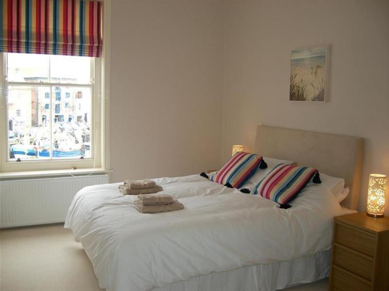 Double bedroom at Harbour Watch Apartment 6, Weymouth, Dorset
