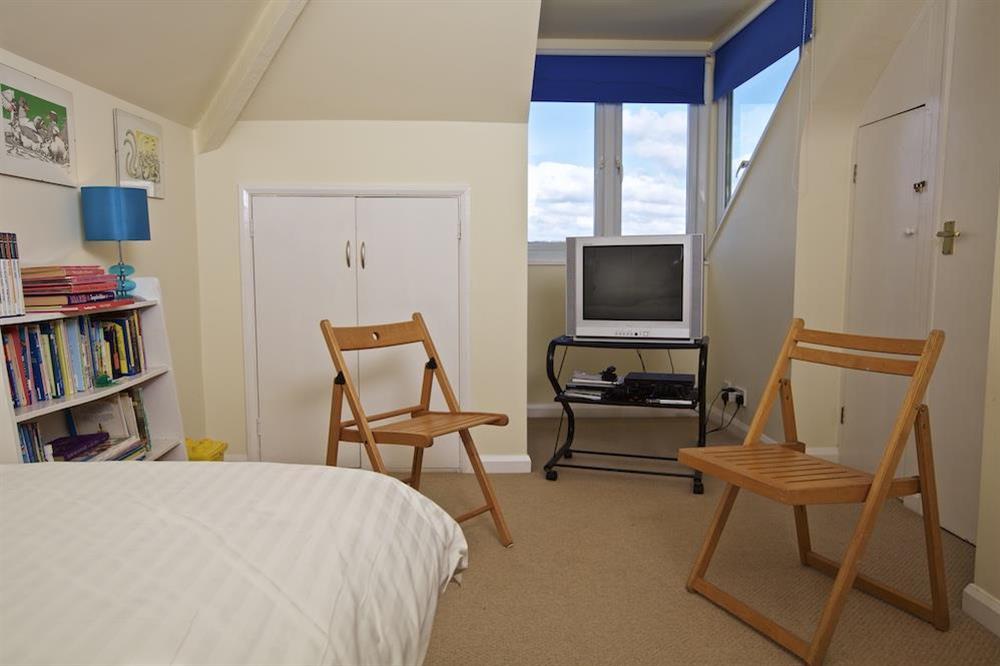 Second floor bedroom with full-size bunk beds and additional 3' single bed (photo 2) at Harbourfield in Herbert Road, Salcombe