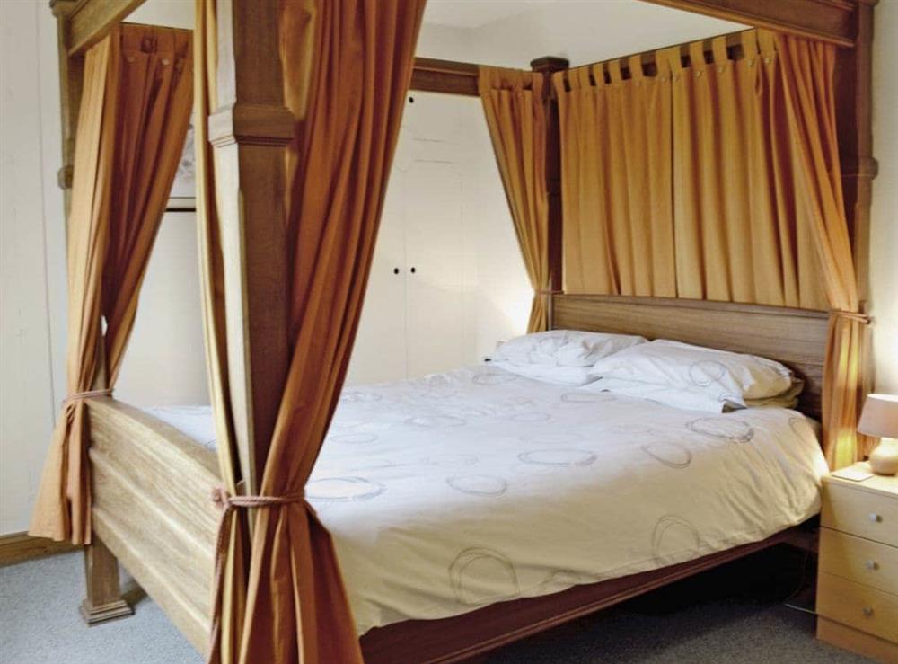 Four Poster bedroom at Harbourhill in Chickerell, near Weymouth, Dorset