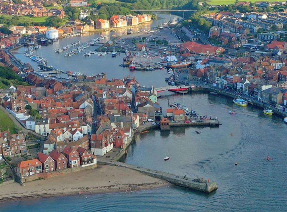 Complex with Sun shining on it, showing close proximity to the harbour at Harbourside House in Whitby, North Yorkshire