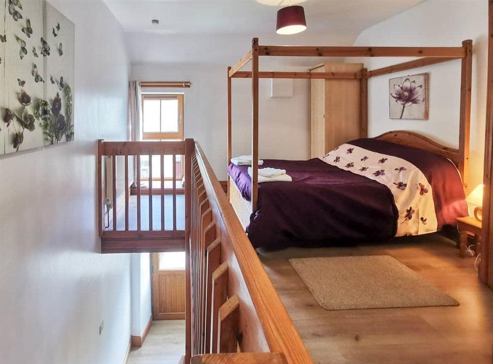 Four Poster bedroom at The Calf Shed, 