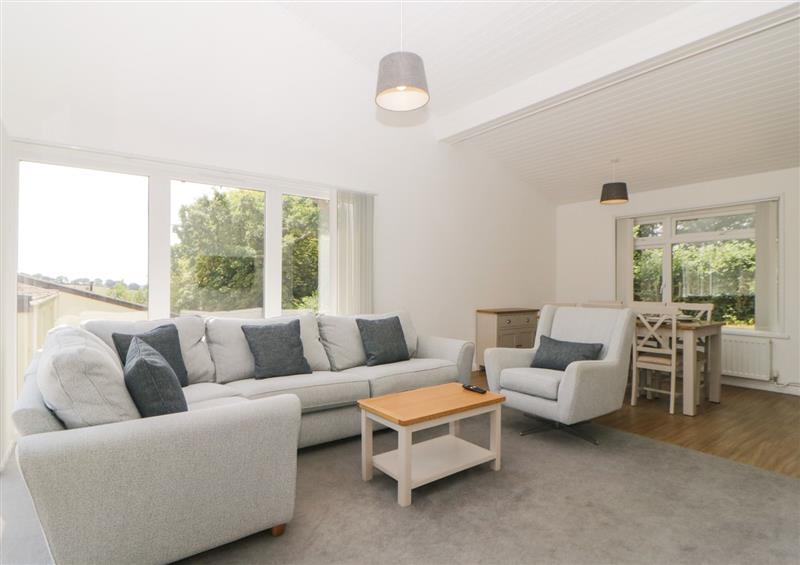 Relax in the living area at Harcombe House Bungalow 10, Chudleigh