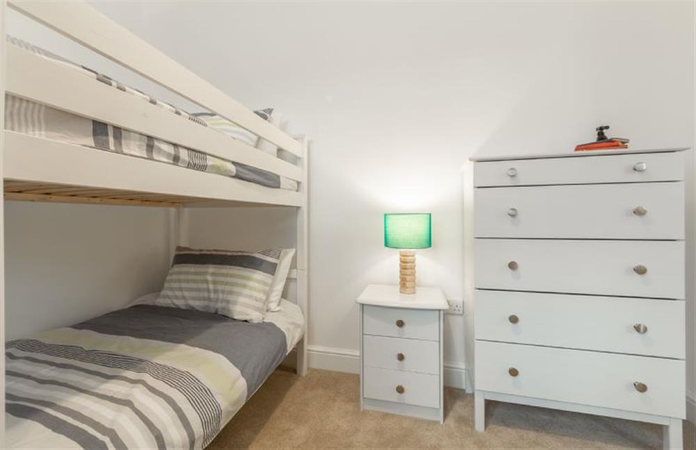First floor: Bedroom three also has plenty of storage at Hare Cottage, Bodham near Holt