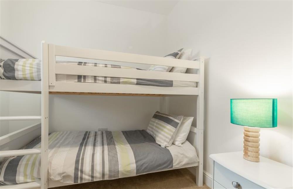 First floor: Bedroom three with full-size bunk beds at Hare Cottage, Bodham near Holt