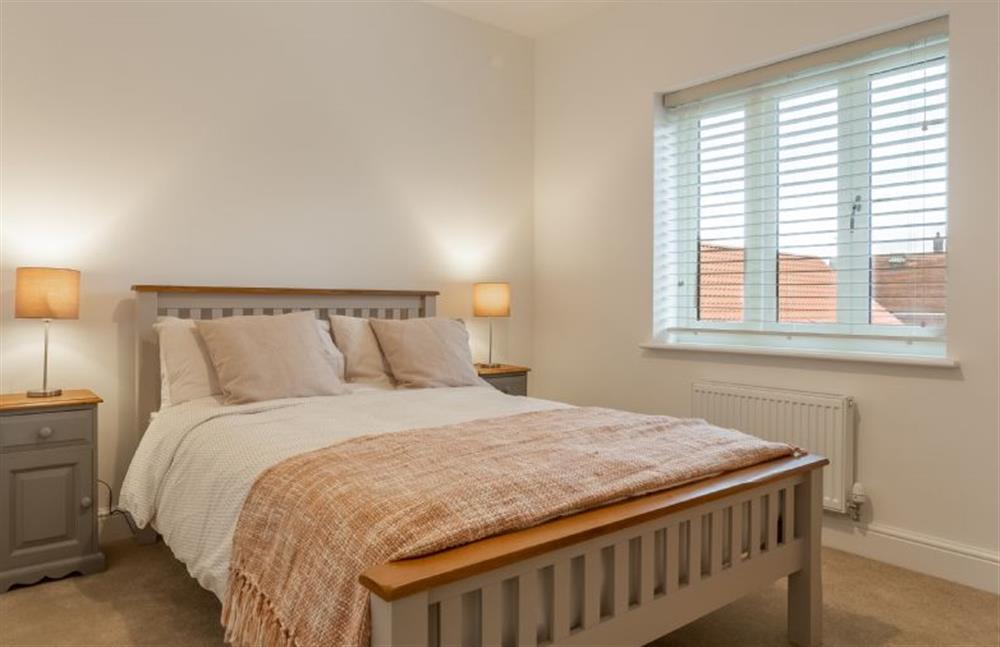 First floor: Bedroom two with double bed and views to the front at Hare Cottage, Bodham near Holt