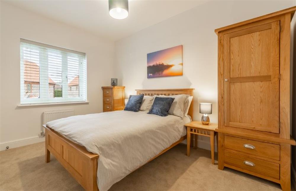 First floor: Master bedroom has a double bed plus plenty of storage at Hare Cottage, Bodham near Holt