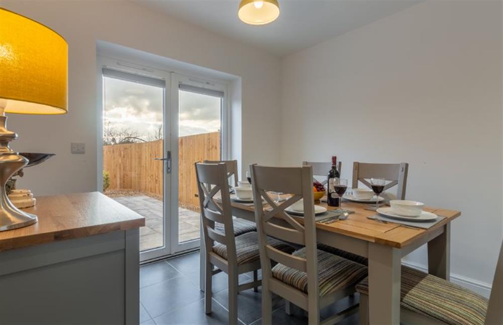 Ground floor: Dining kitchen with french doors leading onto the rear garden at Hare Cottage, Bodham near Holt