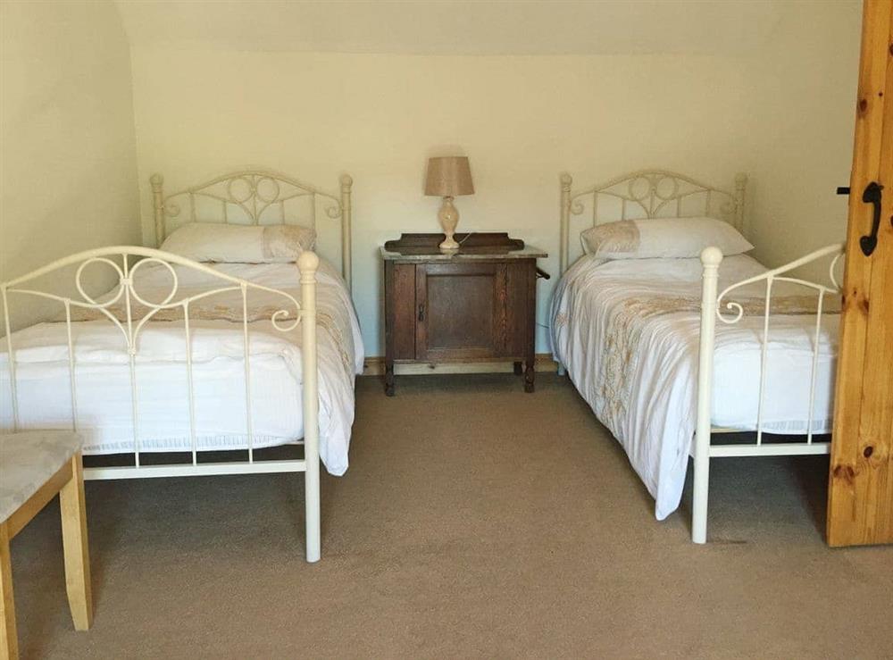 Comfortable twin bedroom at Hare Cottage in North Tuddenham, near East Dereham, Norfolk