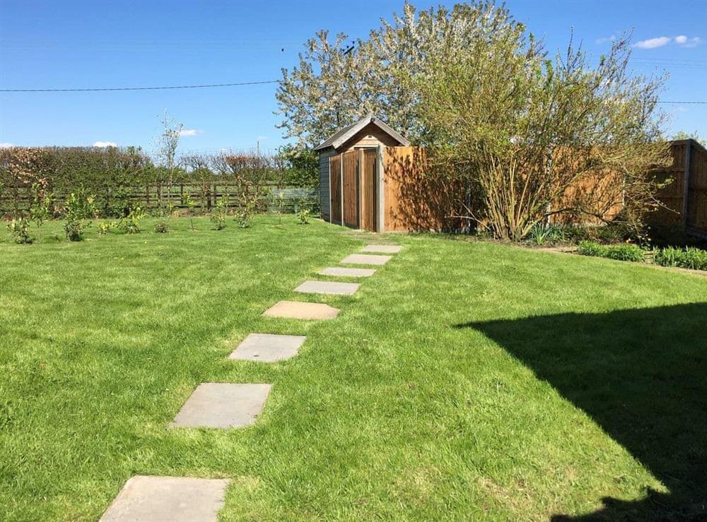 Peaceful garden at Hare Cottage in North Tuddenham, near East Dereham, Norfolk