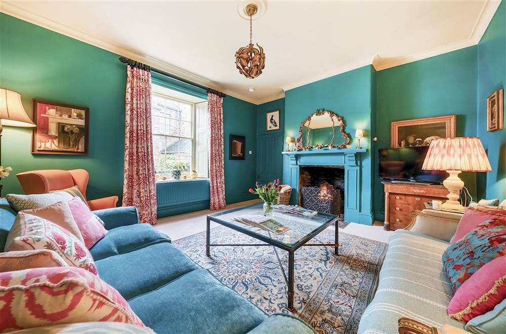 Stylish furnishings adorn the sitting room