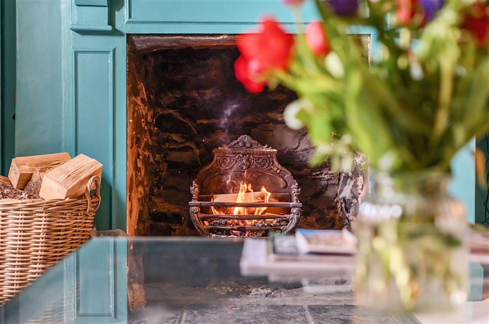 The open fire invites you to relax after days spent exploring the countryside