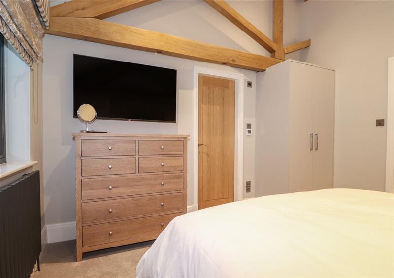 A bedroom in Hare's Breath (photo 4) at Hares Breath, Bowness-On-Windermere